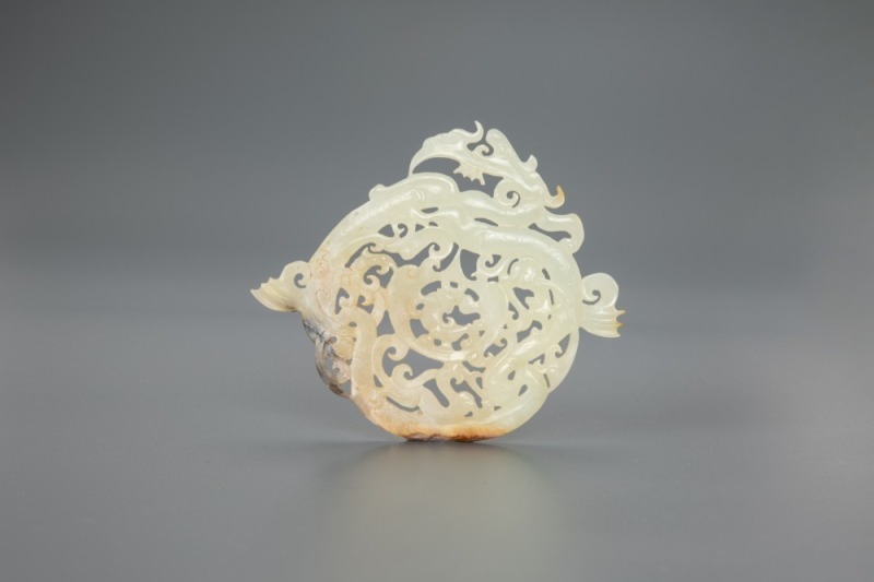 A Chinese White Jade Carved Phoenix Pendant (Han Dynasty)