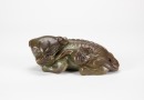 A Chinese Green Jade Figure Of A Recumbent Lion (Song/Ming)