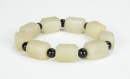 A Chinese White Jade Carved Nine Small Cong Shape Bracelet - 4