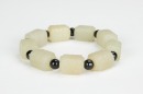 A Chinese White Jade Carved Nine Small Cong Shape Bracelet - 5