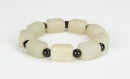 A Chinese White Jade Carved Nine Small Cong Shape Bracelet - 7