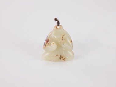 A Chinese White Jade Figure Of A Seated Mythical Beast (Qing or Earlier)