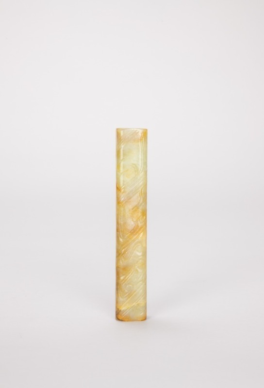 A Chinese Carved White Jade Tube (Zhao Dynasty)