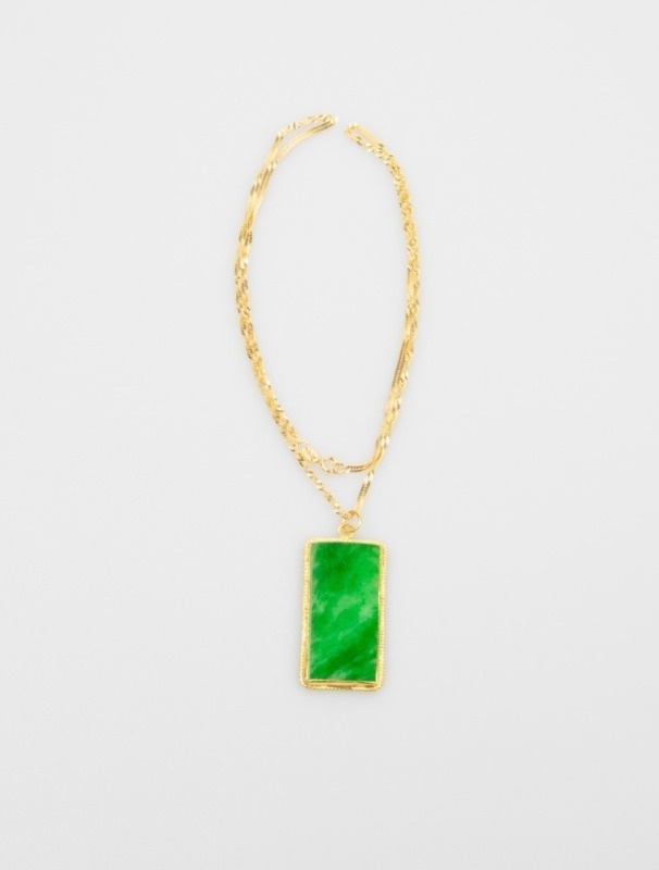 A 14k Glod Italy Mark Necklace And Green Green Pendant.