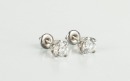 A Pair Of Round Cut Diamond Stud Earing