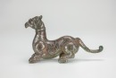 A Chinese Silver-Inlaid Bronze Insert Turquoise’Phoenix Head Tiger Shape’ Zhen, (Warring State Period)