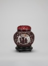 A Chinese Carved Red Glass Overlay Jar With Cover (Woodstand)