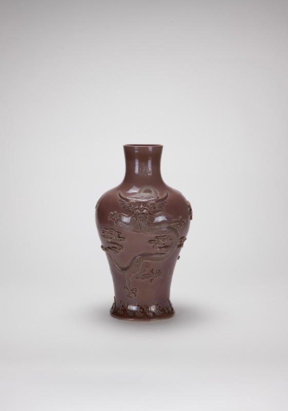 A Chinese Peach Red Glazed Carved ‘Cloud Dargon’ Vase (Late Qing/Republic)