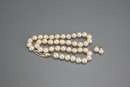 A Set of Pearl Necklace And Earring
