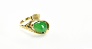 A Natural Green Jadeite Mounted 14k Gold Ring