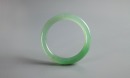 A Semi-Translucent Light Green Jadeite Bangle