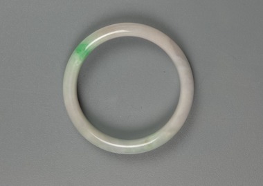 A Green And Light Lavender Jadeite Bangle