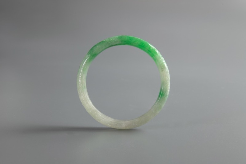 A Semi-Translucent Green Jadeite Bangle