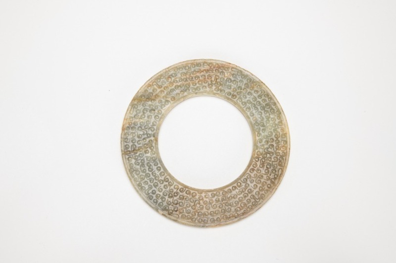 A Carved Jade Disc.