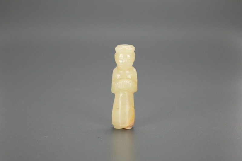 A Chinese White Jade Carved Standing Figuer
