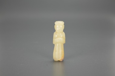 A Chinese White Jade Carved Standing Figuer