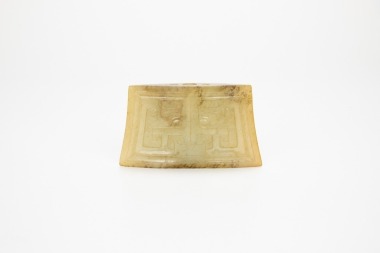 A Chinese Yellowish White Jade Carved &lsquo;Beast-Face&rsquo; Pendant