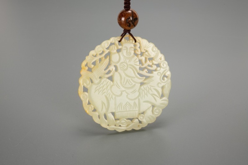 A Chinese White Jade Carved &lsquo;Child Ride Qilin&rsquo; Pendant.