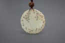 A Chinese White Jade Carved &lsquo;Child Ride Qilin&rsquo; Pendant. - 2
