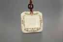 A Chinese White Jade Pendant Carved &lsquo;Shou,Deer&rsquo;.