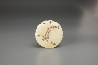 A Chinese White Jade Carved &lsquo;Peaches And Bat&rsquo; Pendant.