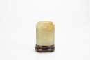 A Chinese White Jade Cong With Woodstand.