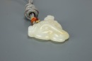 A Chinese White Jade Carved Leopard Face Pendant - 4
