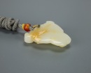 A Chinese White Jade Carved Leopard Face Pendant - 6