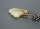 A Chinese White Jade Carved Leopard Face Pendant - 7