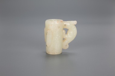 A Chinese White Jade Carved &lsquo;Beast&rsquo; Tube