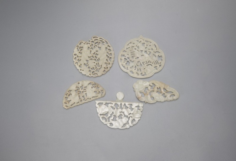 A Group Of Five Chinese White Jade Ornaments.