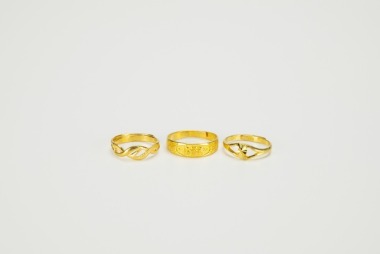 A Three 24k Gold Ring