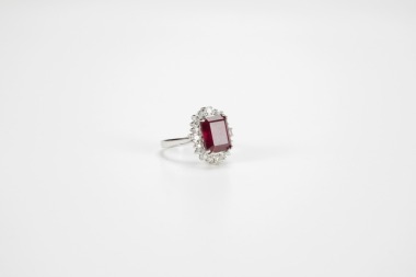 A Ruby Mounted With Diamonds And 14k White Gold