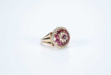 A Ruby Mounted With Diamonds And 14k Gold Ring