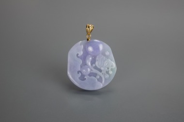 A Lavender Jadeite Carved Butterfly Mounted 18k Gold Pendant.