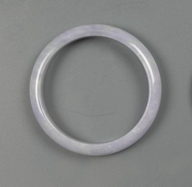 A Lavender Jadeite Bangle.