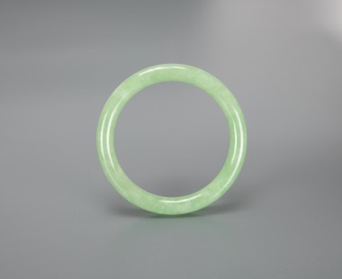 A Apple Green Jadeite Bangle.
