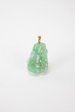 A Green Jadeite Carved Bamboo Pendant.