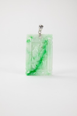 A Apple Green Jadeite Carved&rsquo;Koi And Bamboo&rsquo; Pendant.