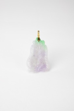 A Lavender Green Jadeite Carved &lsquo;Fan&rsquo; Shape Pendant.