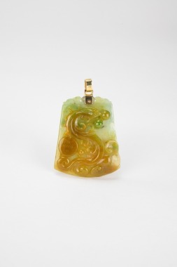 A Yellowish Jadeite Carved &lsquo;Dragon&rsquo; Pendnt