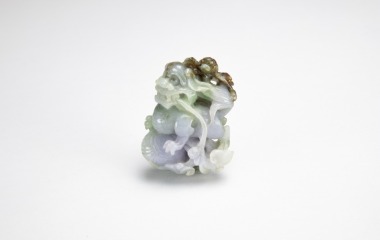 A Lavender And Green Jadeite Carved &lsquo;Beast&rsquo; Pendant