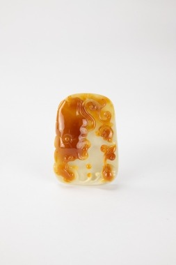 A Yellowish Jadeite Carved &lsquo;Flowers&rsquo; Pendant