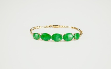 A Five Small Pear Shape Jadeite Mounted With 14k Gold Bracelet.