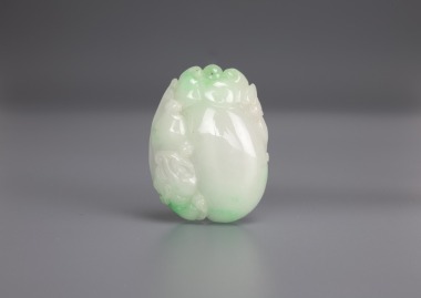 A Jadeite Carved Melon Pendant.