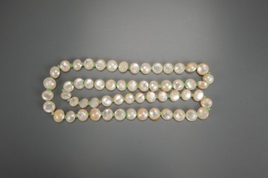 A Mother Of Peral Beads And Jadeite Beads Necklace