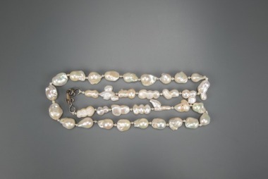 A Thirty Four Beads Natural Pearl Necklace