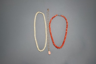 A Group Of Three Necklace.