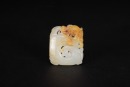 A Russet White Jade Carved &lsquo;Dragon&rsquo; Pendant.