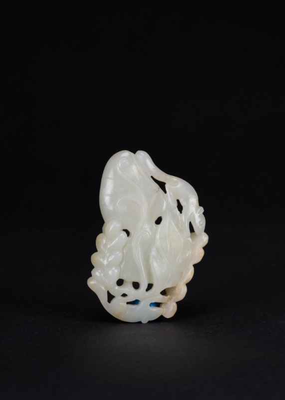 A Russet White Jade Carved &lsquo;Squirrels And Grape&rsquo; Pendant.